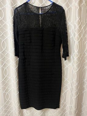 Adrianna Papell Pleated Cocktail Dress Black with lace arms.